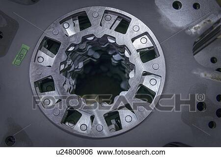 Close up of industrial clutch parts on production line, overhead view View Large Photo Image Stock Photograph - Close up of industrial clutch parts on production line, overhead view. Fotosearch