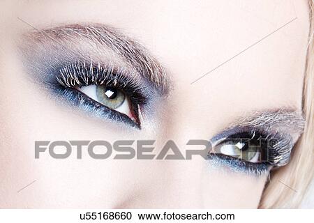 Stock Image - Close up of woman's eyes. Fotosearch