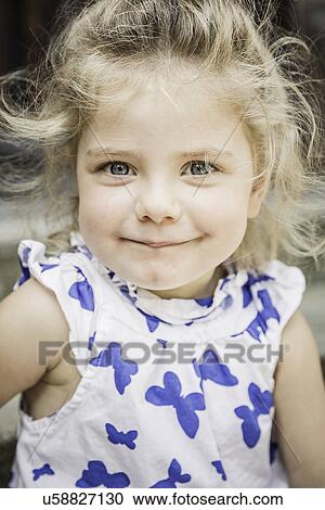 Close up portrait of female toddler in butterfly dress View Large Photo Image Stock Image - Close up portrait of female toddler in butterfly dress. Fotosearch