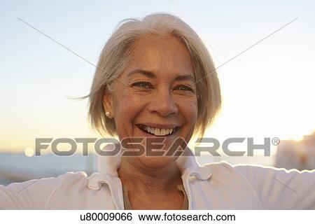 Close up portrait of silver-haired mature woman View Large Photo Image Stock Photograph - Close up portrait of silver-haired mature woman. Fotosearch