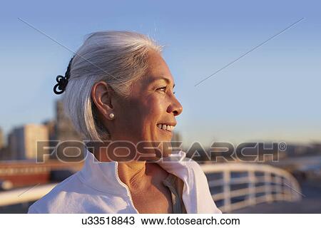 Close up profile of silver-haired mature woman View Large Photo Image Stock Image - Close up profile of silver-haired mature woman. Fotosearch