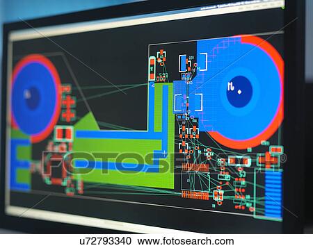 Stock Image - Computer screens with electronic circuitry designs for automotive use. Fotosearch