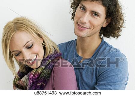 Cropped studio shot of happy couple View Large Photo Image Stock Image - Cropped studio shot of happy couple. Fotosearch