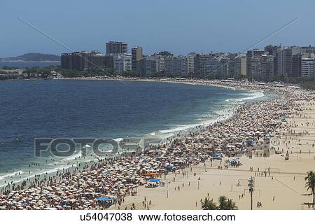 Crowds of holiday makers on Ipanema beach, Rio De Janeiro, Brazil View Large Photo Image Stock Photo - Crowds of holiday makers on Ipanema beach, Rio De Janeiro, Brazil. Fotosearch