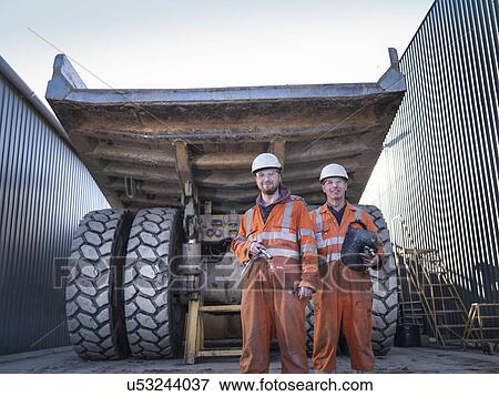 Father and son engineers in engineering workshop, portrait View Large Photo Image Stock Photo - Father and son engineers in engineering workshop, portrait. Fotosearch