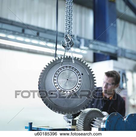 Stock Photograph - Gear for industrial gearbox in engineering factory. Fotosearch