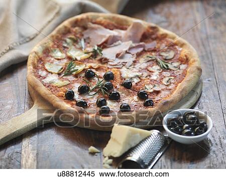 Homemade quattro stagioni pizza with ham, artichokes, olives, mushrooms and mozzarella cheese View Large Photo Image Stock Photography - Homemade quattro stagioni pizza with ham, artichokes, olives, mushrooms and mozzarella cheese. Fotosearch