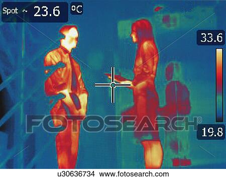 Picture - Infrared heat image of office workers in meeting. Fotosearch