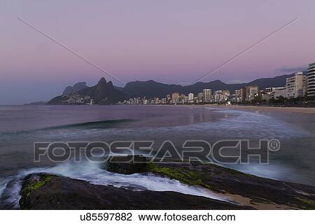 Ipanema beach at sunrise, Rio De Janeiro, Brazil View Large Photo Image Stock Image - Ipanema beach at sunrise, Rio De Janeiro, Brazil. Fotosearch