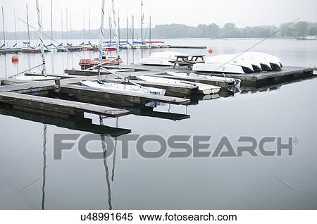 Jetty and boats in marina, Dusseldorf, Germany View Large Photo Image Stock Photography - Jetty and boats in marina, Dusseldorf, Germany. Fotosearch