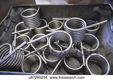 Picture - Large amount of springs in testing laboratory, close up. Fotosearch