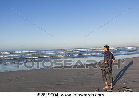 Man enjoying beach View Large Photo Image Picture - Man enjoying beach. Fotosearch