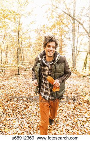 Man running in forest View Large Photo Image Stock Photo - Man running in forest. Fotosearch