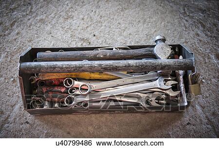 Overhead view of toolbox containing hammer and spanners View Large Photo Image Stock Photograph - Overhead view of toolbox containing hammer and spanners. Fotosearch