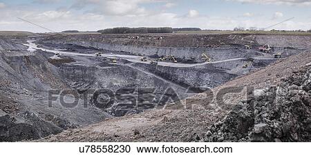 Stock Image - Overview of excavation and geology in surface coal mine. Fotosearch