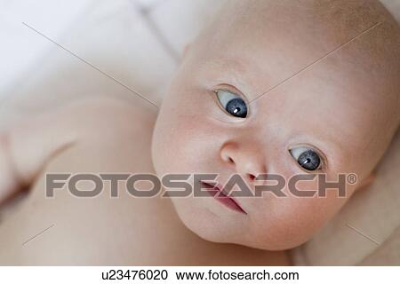 Stock Image - Portrait of baby girl, close-up. Fotosearch