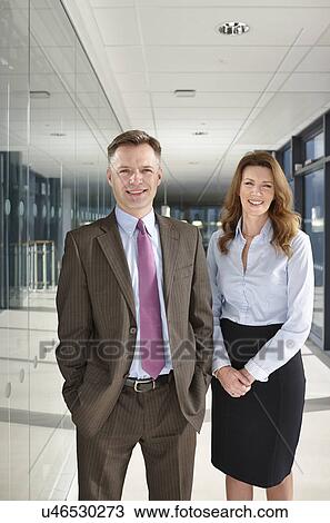 Portrait of business colleagues in corridor View Large Photo Image Stock Image - Portrait of business colleagues in corridor. Fotosearch