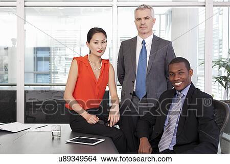 Picture - Portrait of manager and partners in office. Fotosearch