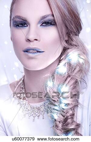 Stock Photo - Portrait of woman in frosty make-up. Fotosearch