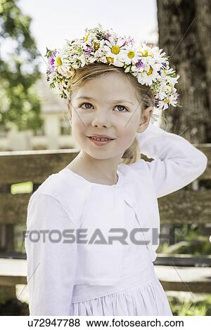 Portrait of young bridesmaid with floral headdress View Large Photo Image Stock Photo - Portrait of young bridesmaid with floral headdress. Fotosearch