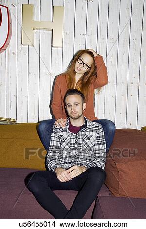Portrait of young couple hanging out View Large Photo Image Picture - Portrait of young couple hanging out. Fotosearch
