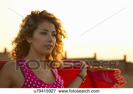 Portrait of young woman on beach View Large Photo Image Stock Photo - Portrait of young woman on beach. Fotosearch