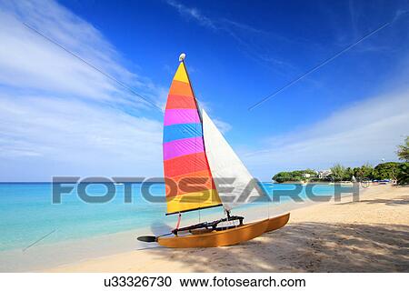 Sailboat on beach, Barbados, Caribbean View Large Photo Image Stock Image - Sailboat on beach, Barbados, Caribbean. Fotosearch