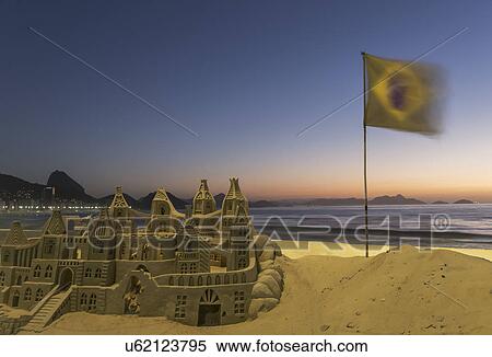 Sandcastle and Brazilian flag on Copacabana beach, Rio De Janeiro, Brazil View Large Photo Image Stock Photography - Sandcastle and Brazilian flag on Copacabana beach, Rio De Janeiro, Brazil. Fotosearch