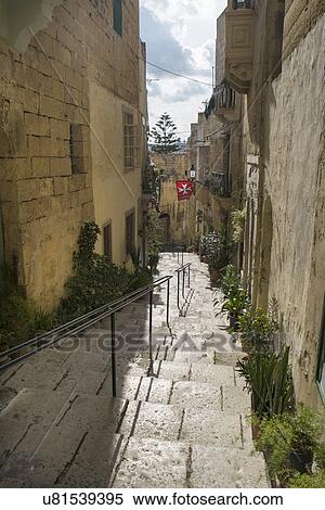 Staircase of typical narrow hilly street, Vittoriosa, Malta View Large Photo Image Stock Photography - Staircase of typical narrow hilly street, Vittoriosa, Malta. Fotosearch