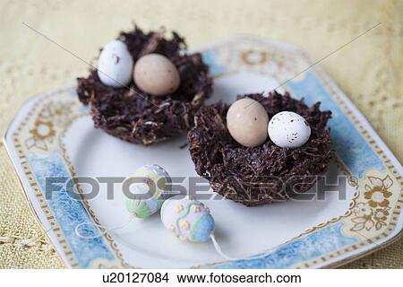 Still life of chocolate easter eggs in chocolate nests View Large Photo Image Picture - Still life of chocolate easter eggs in chocolate nests. Fotosearch