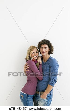 Studio portrait of loving couple View Large Photo Image Stock Photo - Studio portrait of loving couple. Fotosearch