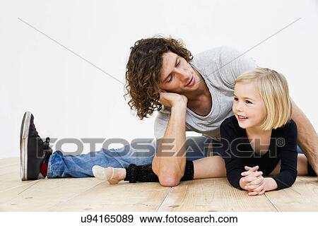 Studio shot of father posing with ballerina daughter View Large Photo Image Stock Photo - Studio shot of father posing with ballerina daughter. Fotosearch