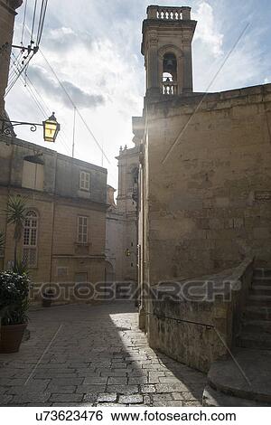 Stock Photograph - Typical narrow street, Vittoriosa, Malta. Fotosearch