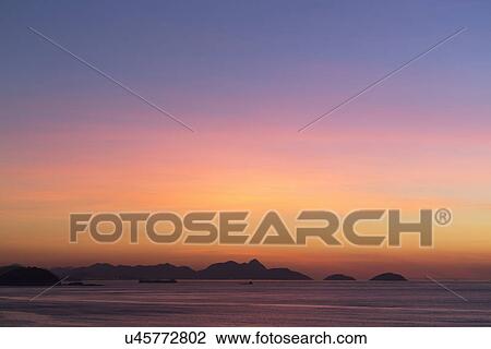 View from Copacabana beach at sunrise Rio De Janeiro, Brazil View Large Photo Image Stock Image - View from Copacabana beach at sunrise Rio De Janeiro, Brazil. Fotosearch