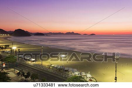 View of Copacabana beach at sunrise Rio De Janeiro, Brazil View Large Photo Image Stock Image - View of Copacabana beach at sunrise Rio De Janeiro, Brazil. Fotosearch