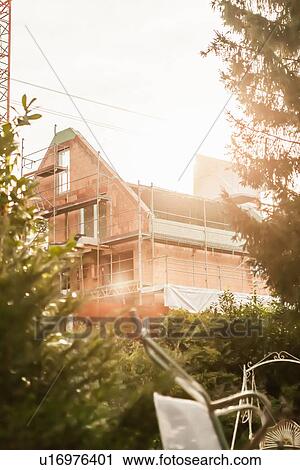 View of house exterior under construction View Large Photo Image Stock Image - View of house exterior under construction. Fotosearch