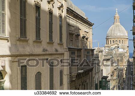 View of Old Mint Street, Dome of Carmelite Church, Valletta, Malta View Large Photo Image Stock Image - View of Old Mint Street, Dome of Carmelite Church, Valletta, Malta. Fotosearch