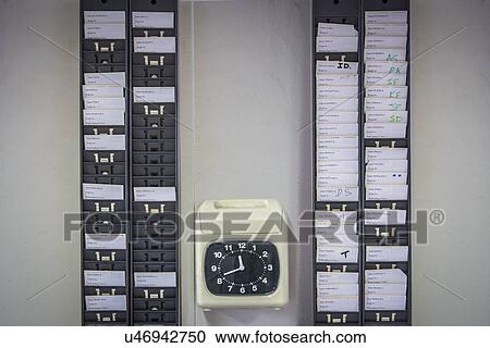 Stock Image - Work time clock in surface coal mine. Fotosearch