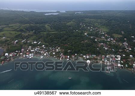 Stock Photo - Aerial view of an island, Bay Islands, Honduras. Fotosearch