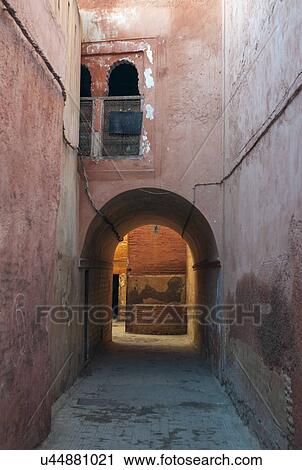 Stock Image - Archway at an alley, Marrakesh, Morocco. Fotosearch