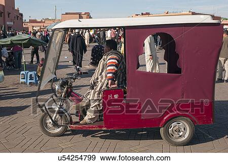 Stock Photo - Auto rickshaw on a street, Marrakesh, Morocco. Fotosearch