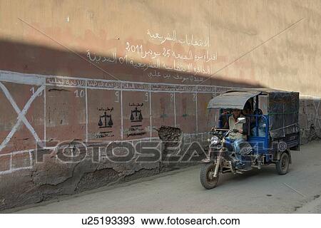 Auto rickshaw on a street, Medina, Marrakesh, Morocco View Large Photo Image Stock Image - Auto rickshaw on a street, Medina, Marrakesh, Morocco. Fotosearch
