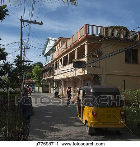 Auto rickshaw on the road, Utila Island, Bay Islands, Honduras View Large Photo Image Stock Image - Auto rickshaw on the road, Utila Island, Bay Islands, Honduras. Fotosearch