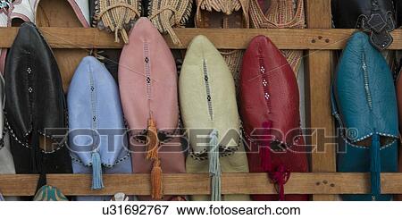 Babouche slippers for sale at market stall, Medina, Marrakesh, Morocco View Large Photo Image Stock Photo - Babouche slippers for sale at market stall, Medina, Marrakesh, Morocco. Fotosearch