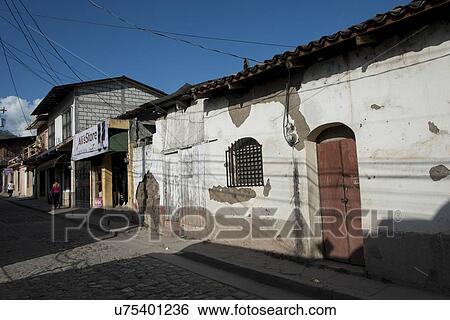 Stock Photograph - Buildings along the street, Barrio El Centro, Copan, Copan Ruinas, Honduras. Fotosearch