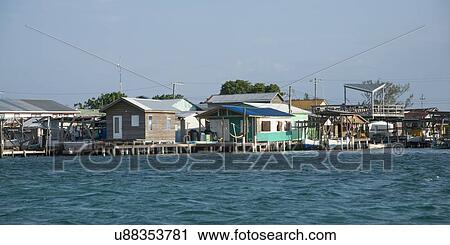 Stock Image - Buildings at the waterfront, Cayman Cay, Utila Island, Bay Islands, Honduras. Fotosearch