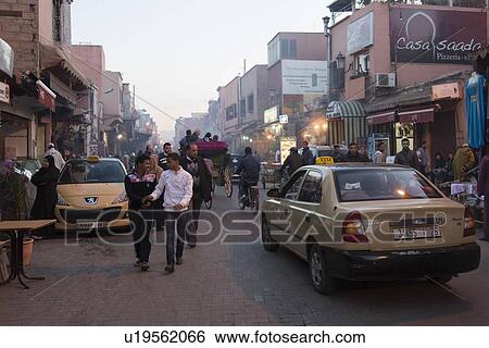Stock Photograph - Busy street scene in a city, Marrakesh, Morocco. Fotosearch