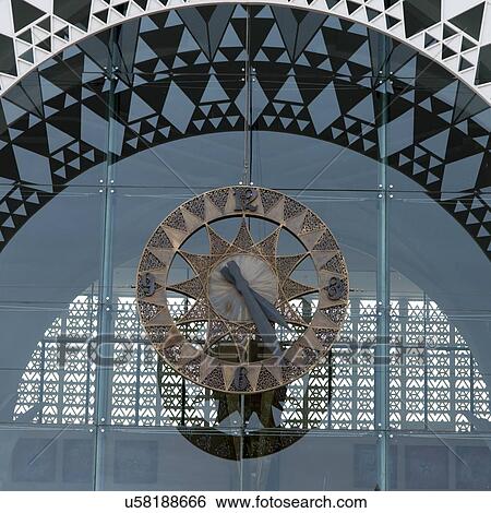 Stock Photograph - Close-up of a clock at Marrakesh Railway Station, Marrakesh, Morocco. Fotosearch