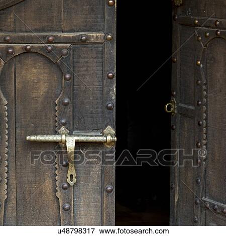Close-up of a metal door latch at Dar Qamar guest house, Agdz, Morocco View Large Photo Image Stock Photo - Close-up of a metal door latch at Dar Qamar guest house, Agdz, Morocco. Fotosearch