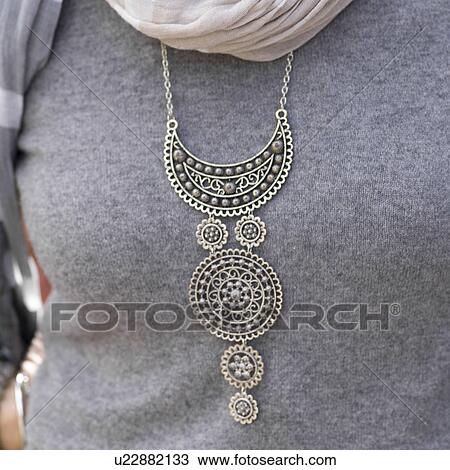 Close-up of a woman wearing traditional necklace, Morocco View Large Photo Image Stock Image - Close-up of a woman wearing traditional necklace, Morocco. Fotosearch
